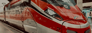 red high speed train in station, CityRailway.com